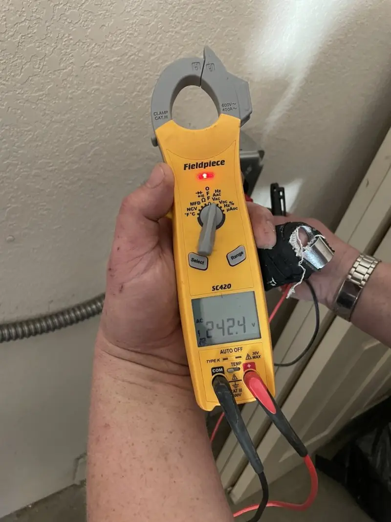 Voltage testing with clamp meter during Hot Tub / Pool Electrical Wiring in Olympia
